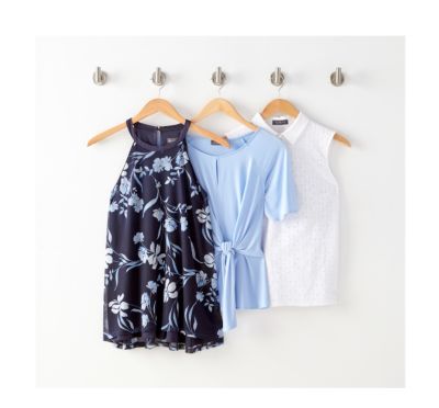 Model in blue pinstripe top with lace detail & white jeans. Model in white bell sleeve top & dark wash jeans. 